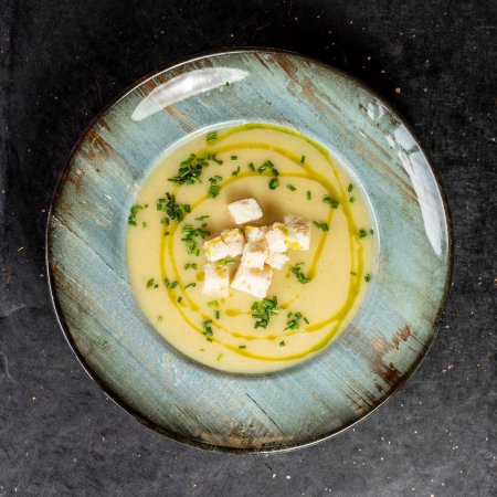 Celery potato creamy soup with herb croutons