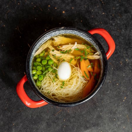 Hen broth with vegetables